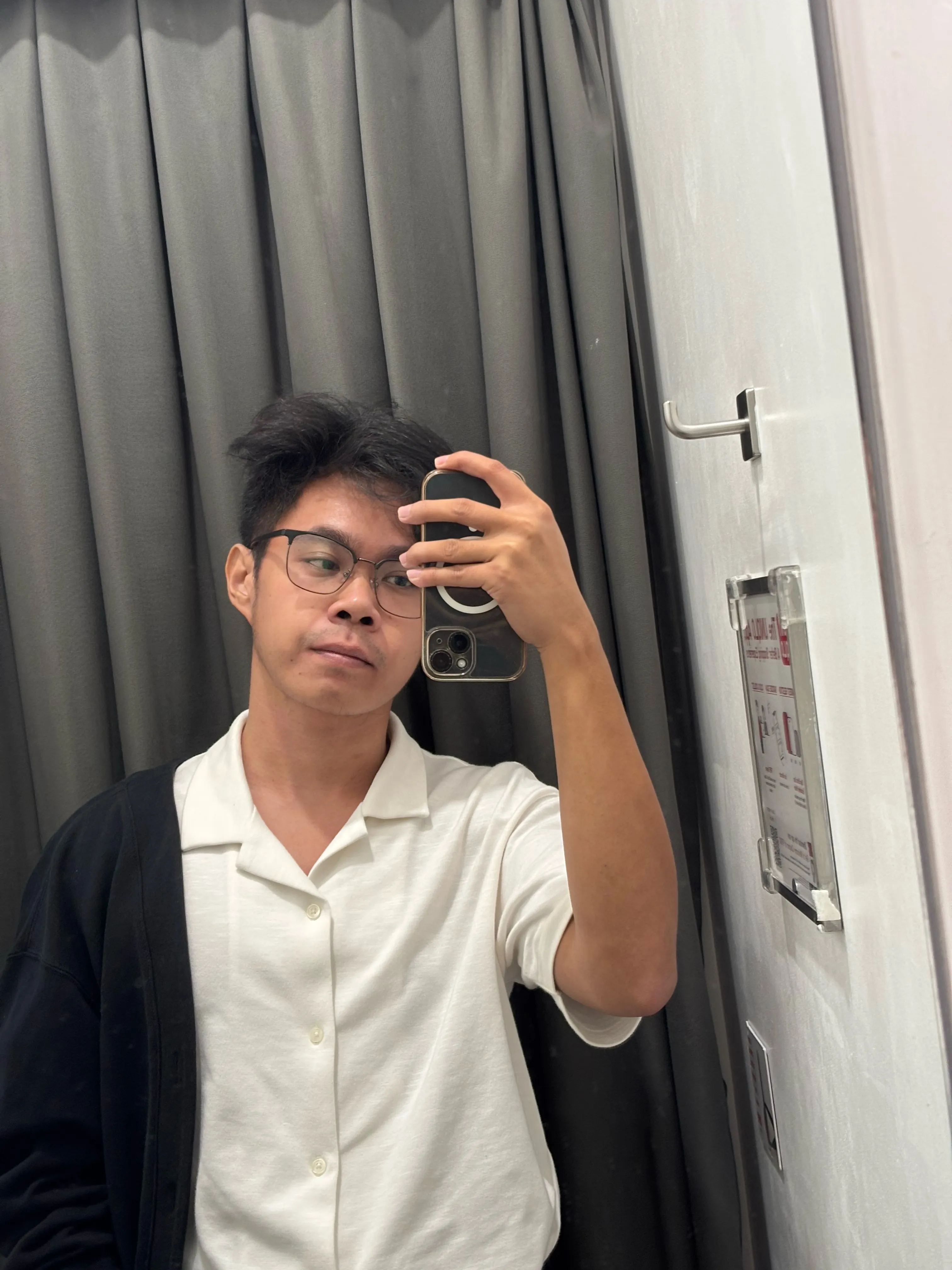 Ericson taking a mirror selfie
