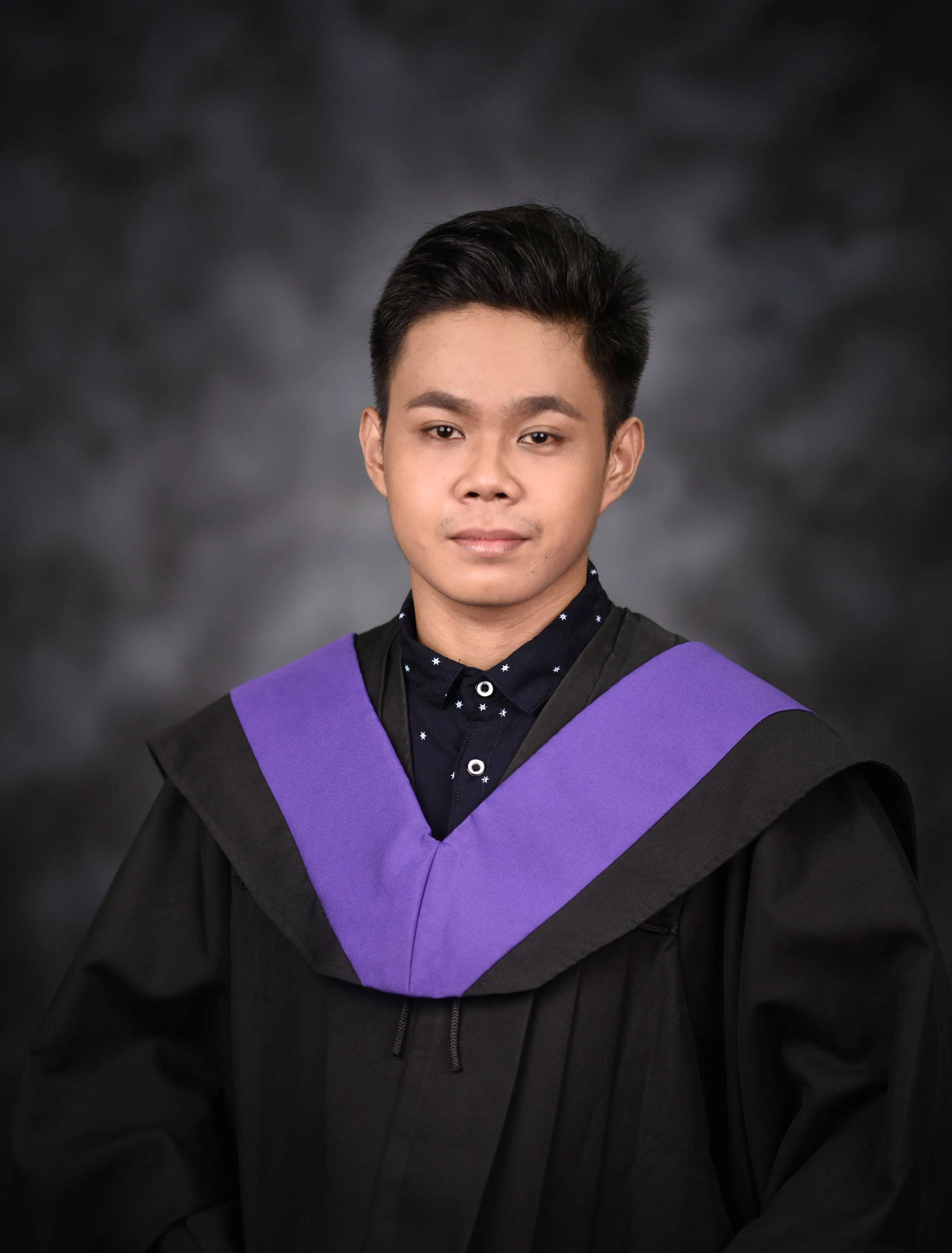 Ericson in his graduation toga