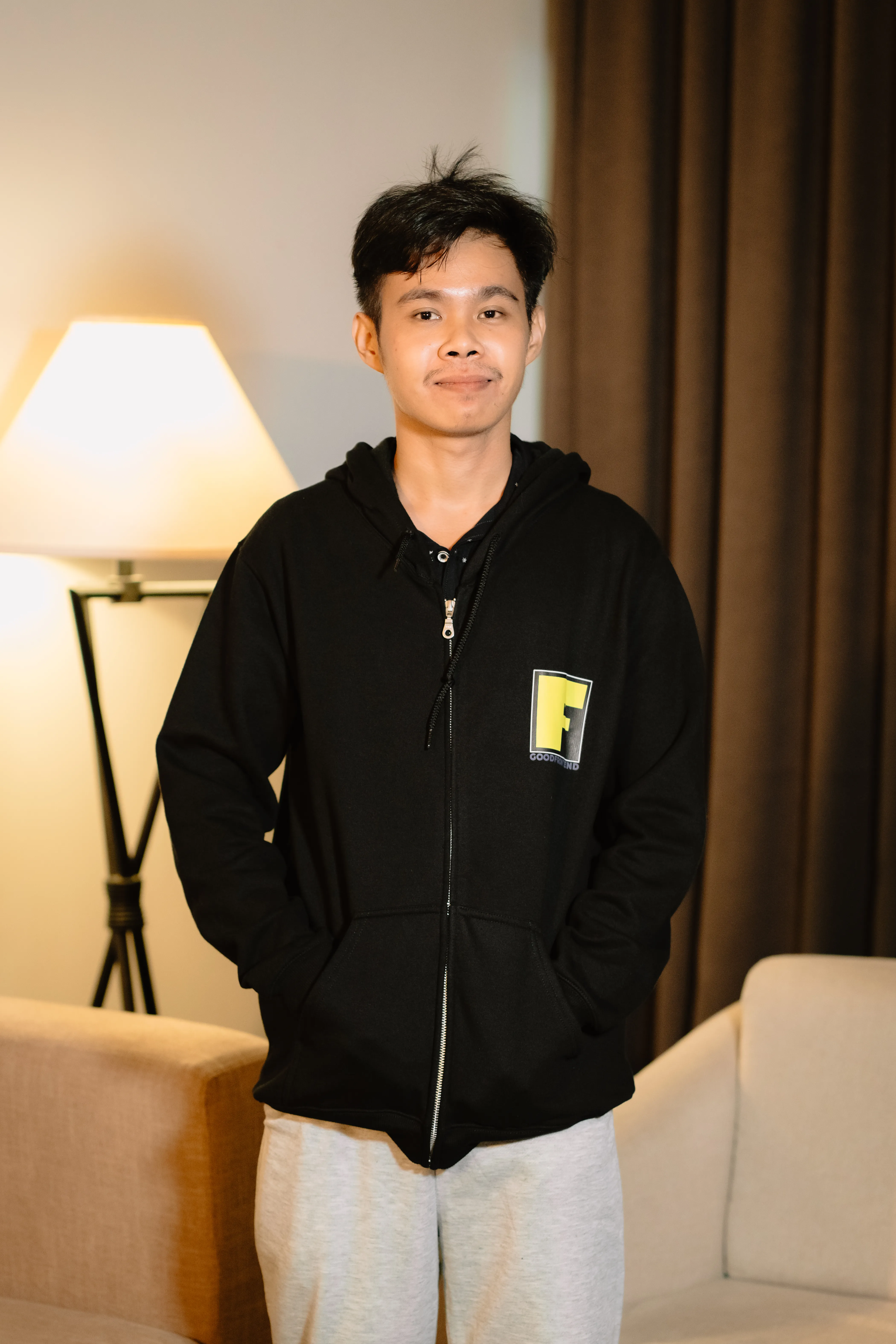 Ericson in a black hoodie, from a portrait session